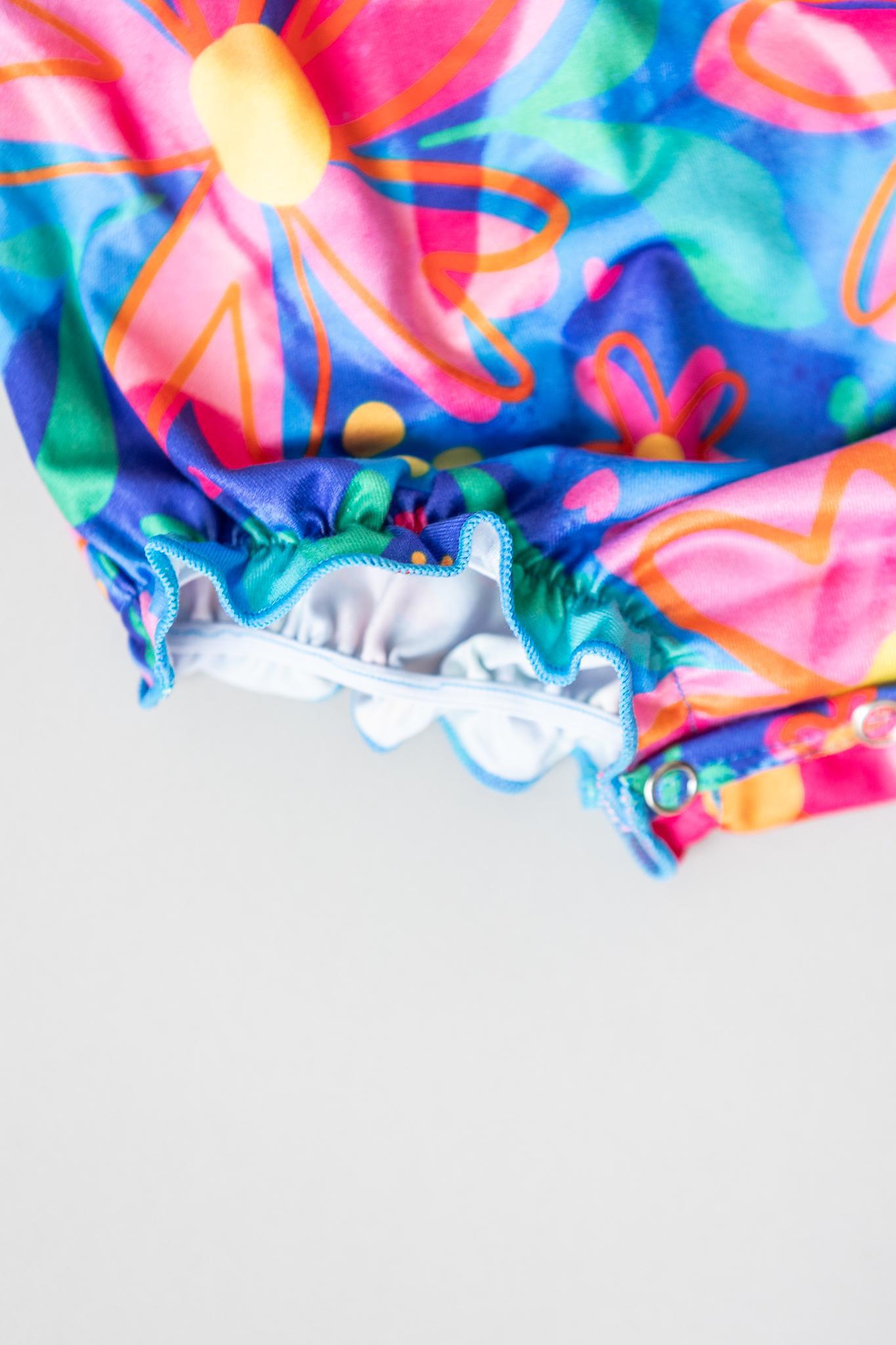 SALE Springing Around Ruffle Cross Back Romper