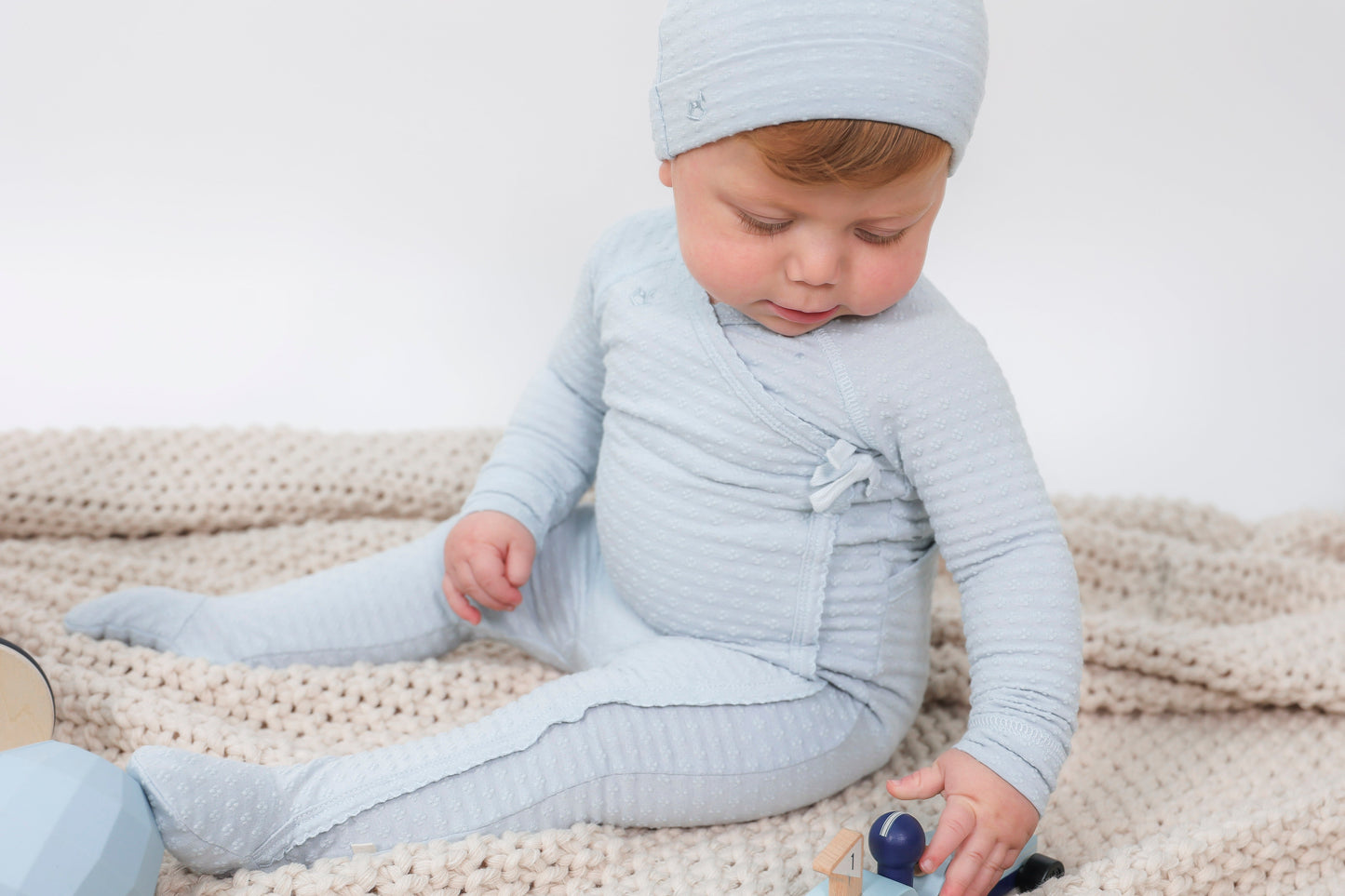 Embossed Diamond Wrap Onesie
