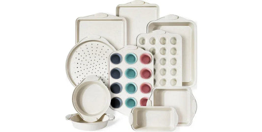 22-piece beige nonstick baking pan set including muffin, pizza, cake, and loaf pans