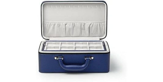 Blue leather jewelry box with three-layer organizer and handle, open to show cushioned compartments