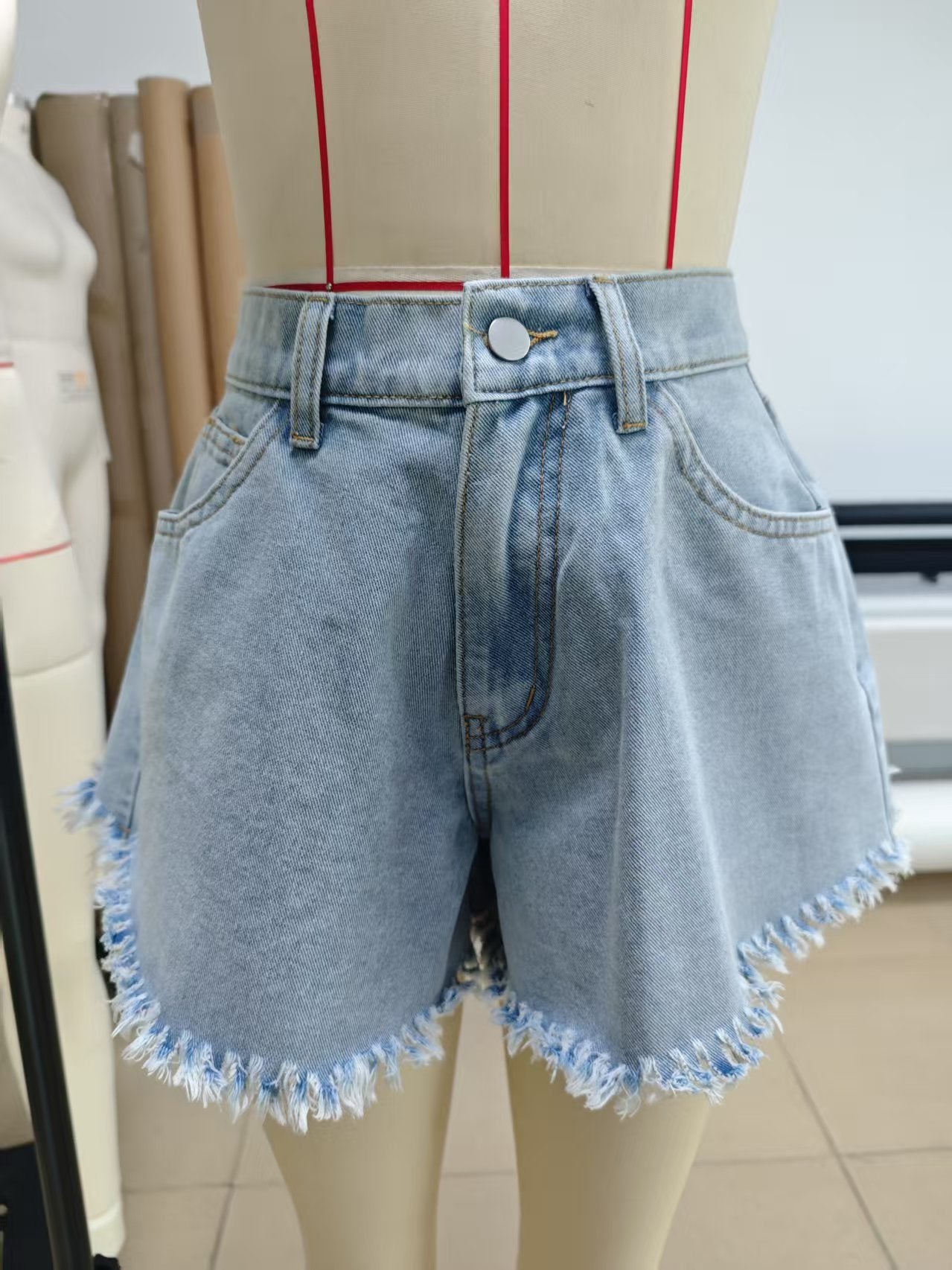 Women Elastic Waist Fur Edge Umbrella Type Denim Shorts Light Blue
