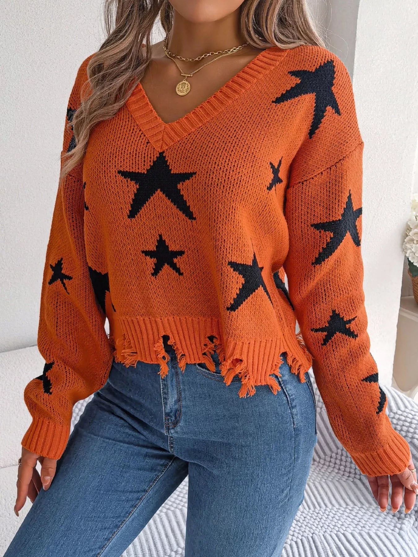 Star Pattern V-Neck Distressed Sweater