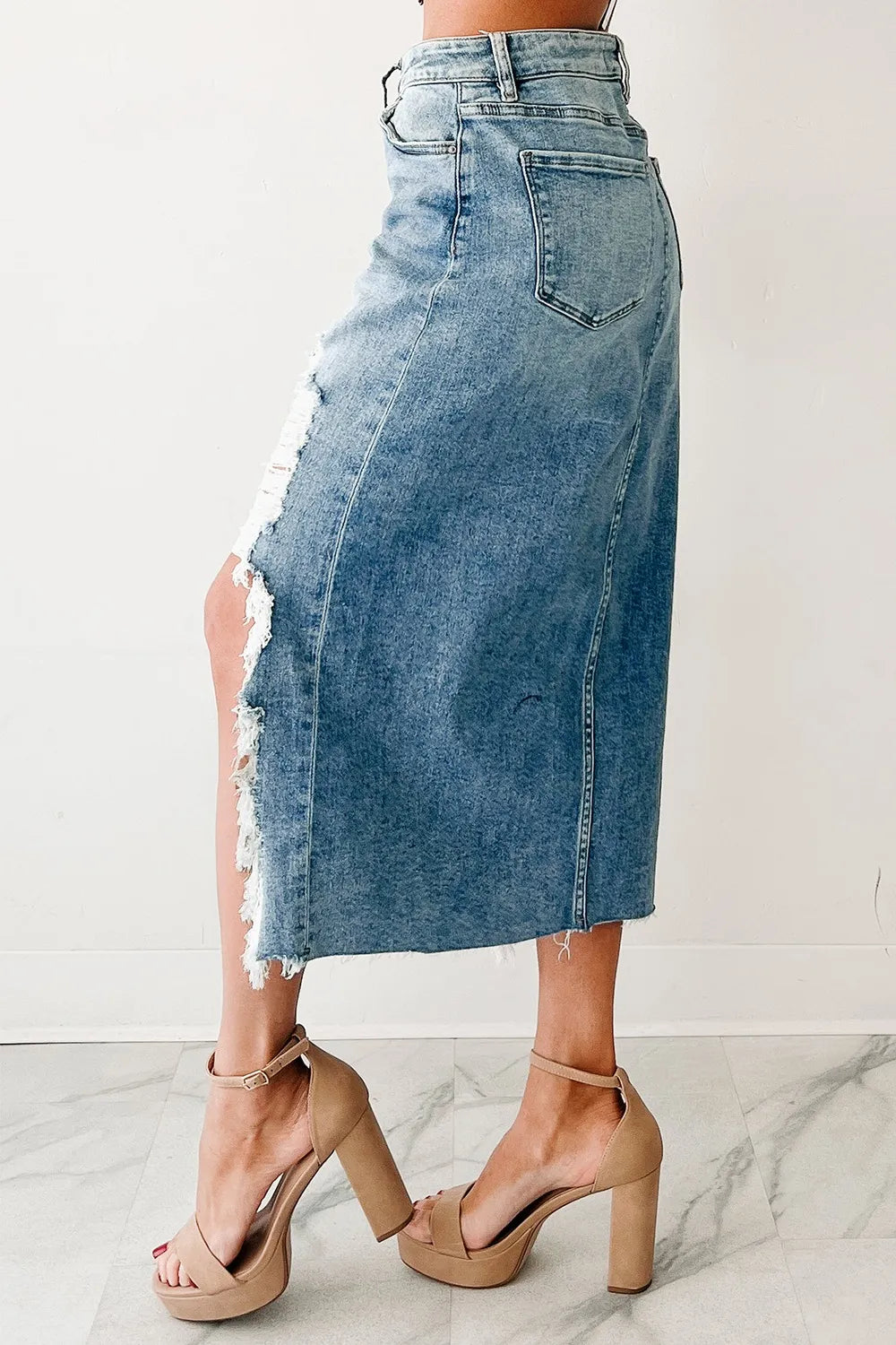 Distressed Asymmetrical Denim Skirt with Frayed Hem