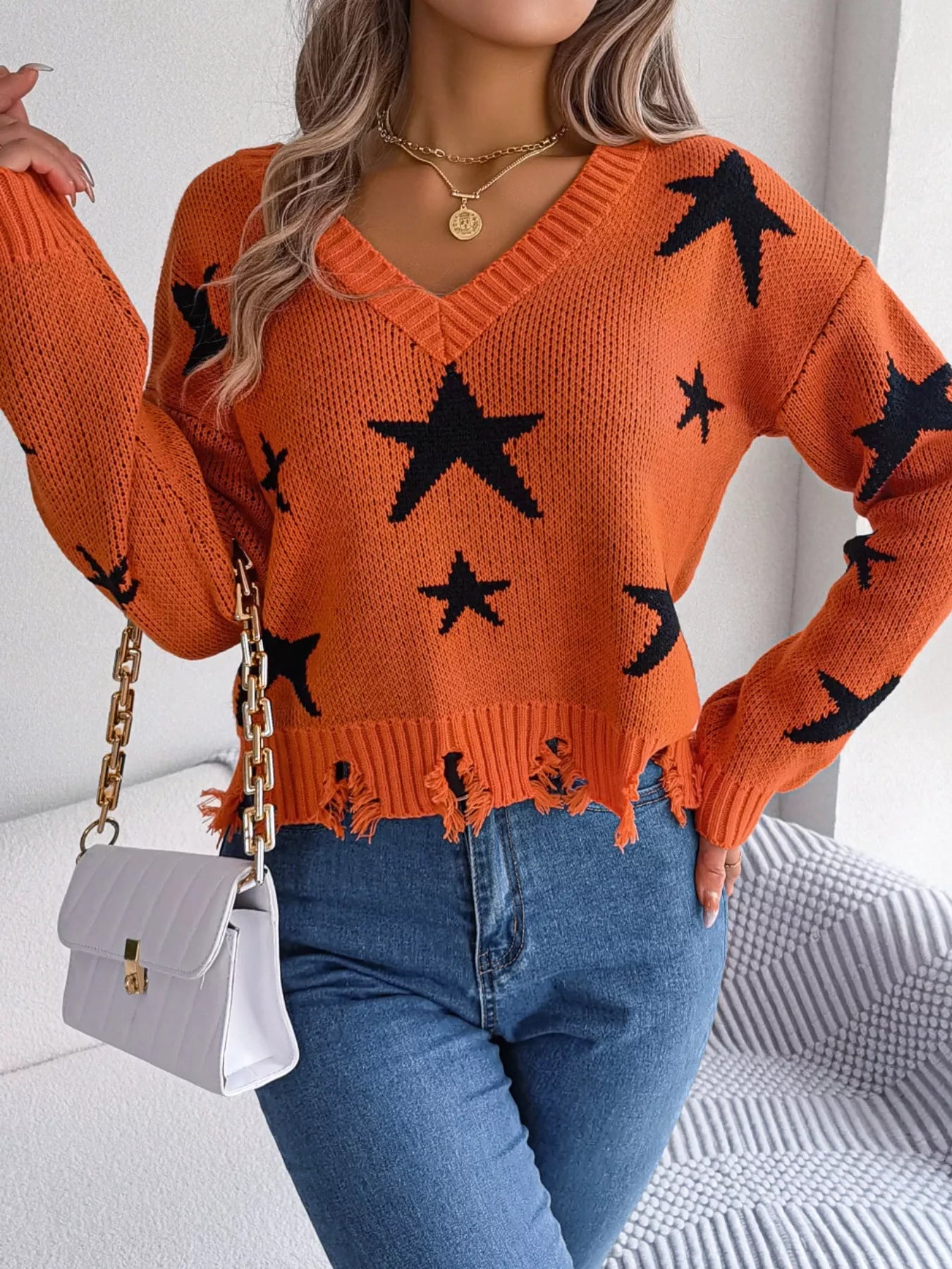Star Pattern V-Neck Distressed Sweater