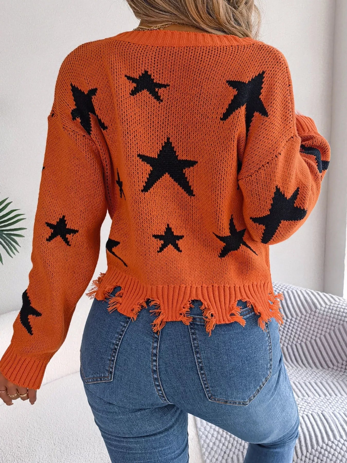 Star Pattern V-Neck Distressed Sweater