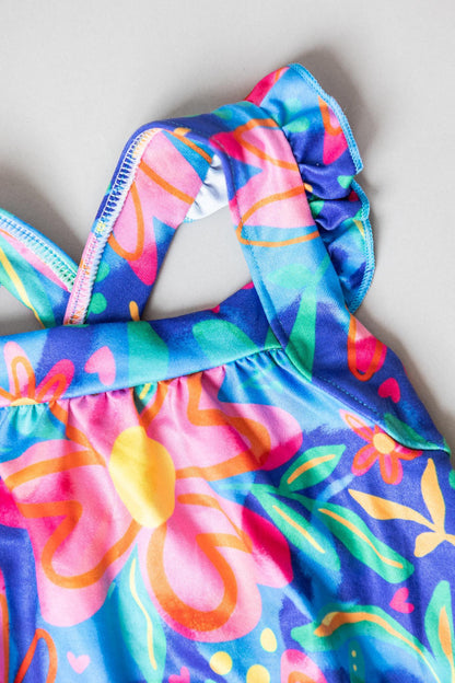 SALE Springing Around Ruffle Cross Back Romper