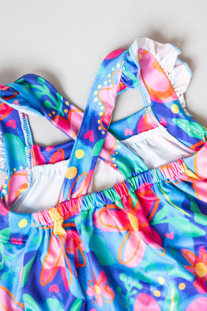 SALE Springing Around Ruffle Cross Back Romper