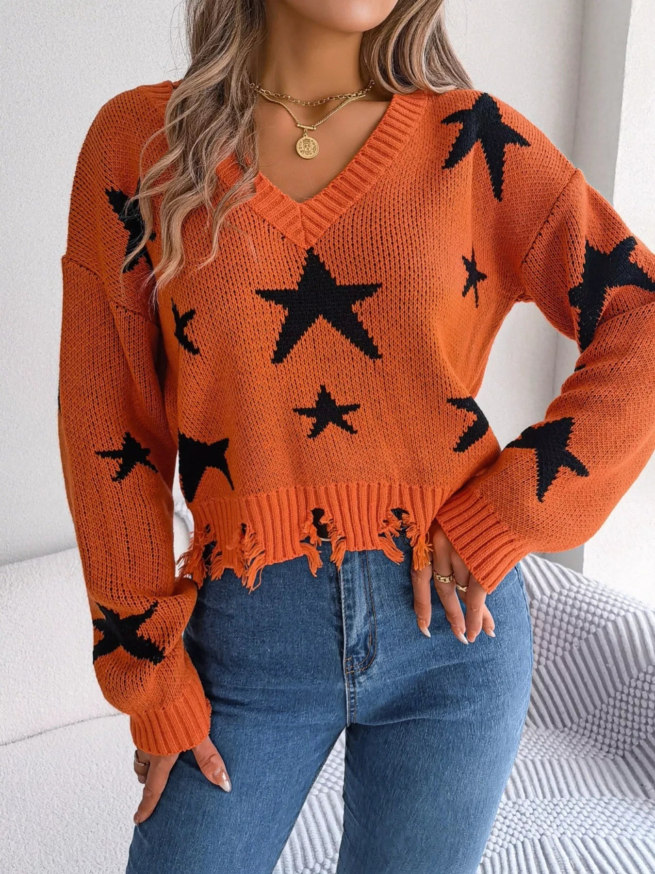 Star Pattern V-Neck Distressed Sweater