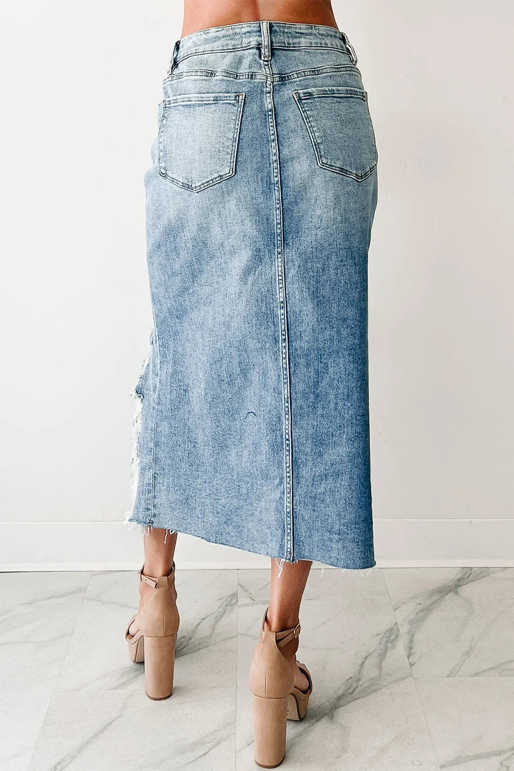 Distressed Asymmetrical Denim Skirt with Frayed Hem